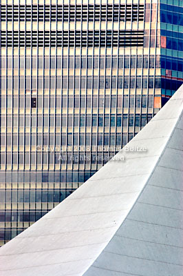 The canvas roof of the visitors center in Lujiazui Park partly obscures the facade of an unfinished building. New building sprout like mushrooms in this city, adding dazzling reflections everywhere.