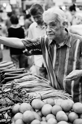 This old man reminded me of a turtle, as he was shopping for vegetables in this Shanghai market. White hair, deep set eyes, dark black eyes made him stand out. 